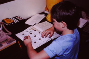 My brother doing his school lessons at motel room desk and you can see the rotary phone in the lower left corner. No wonder the Itty Bitty Inn was bringing back so many memories!